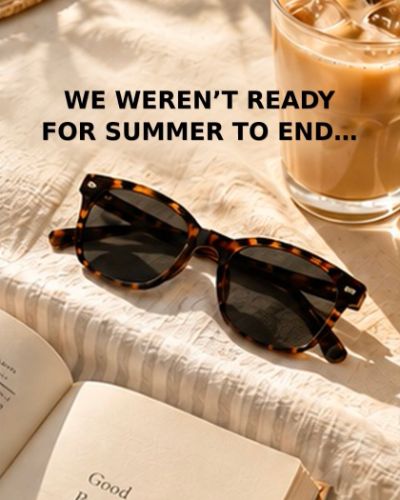 Tortoiseshell sunglasses on an open book